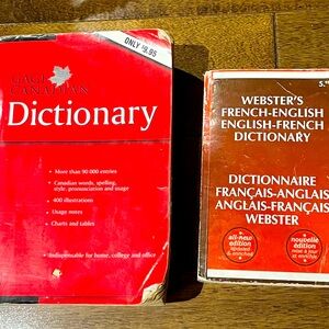2 dictionaries. Cage Canadian, and webster’s French- English/ English-French